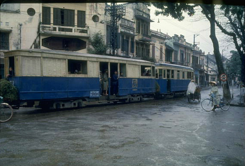 Dilapidated streetcars running in downto