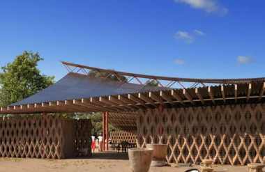 Bản vẽ trung tâm cộng đồng trong dự án Hope Village dự kiến sẽ bắt đầu xây dựng vào năm 2025. Ảnh: Courtesy Hassell and Imigo